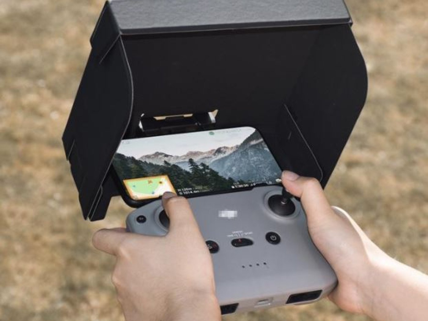 Sluneční clona na dálkový ovladač (pro 6 palcové tablety/telefony)